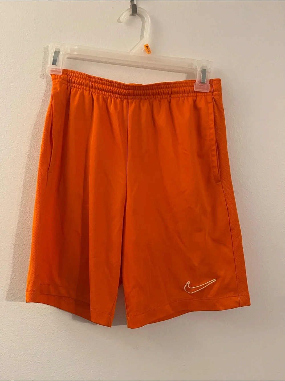 Nike Girl's Bright Orange Athletic Shorts with White Swoosh